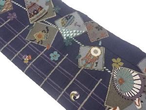 縮緬地金彩色紙に格子・道具・花々模様名古屋帯